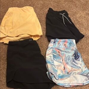 4 pairs of Athleta Girl shorts VGUC